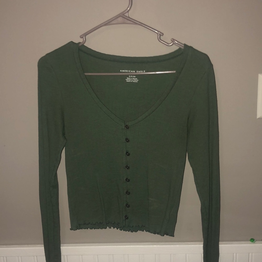 Army green top with buttons down middle